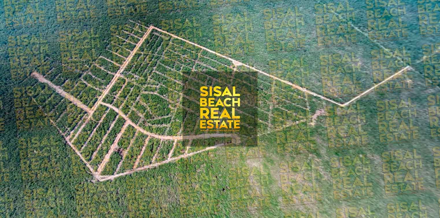 Foto del desarrollo Aldea Sisal desde el aire tomada con drone en el sitio web de la agencia especializada en sisal comercial inmobiliaria